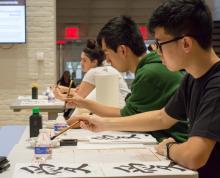 students paining, calligraphy
