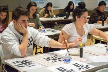 students paining, calligraphy, listeing