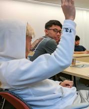 student raising hand, ramen, Williams, classroom